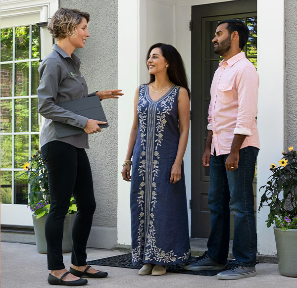 Renewal by Andersen design consultant speaking with Portland homeowners.