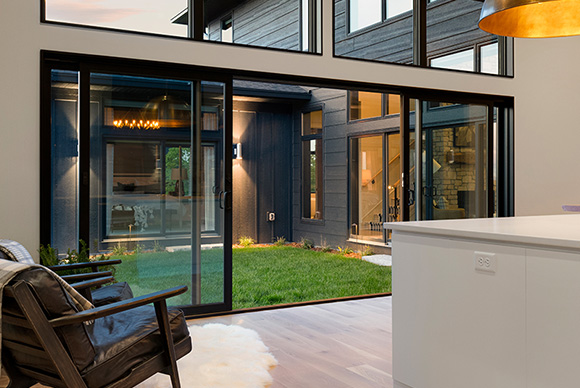 A Renewal by Andersen patio door installed in a kitchen.