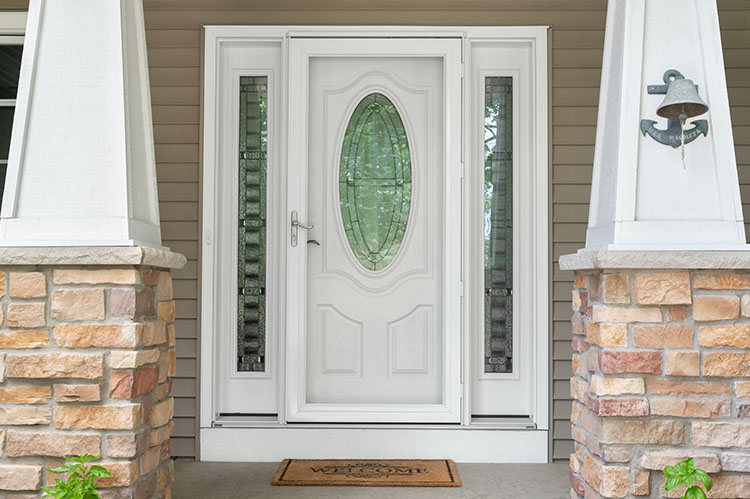 Front door with oval-shaped glass.