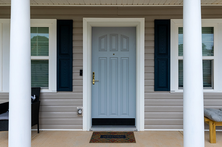 A Renewal by Andersen solid panel door installed in a Portland, Oregon home.