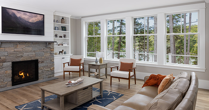 A living room interior with Renewal by Andersen windows installed.